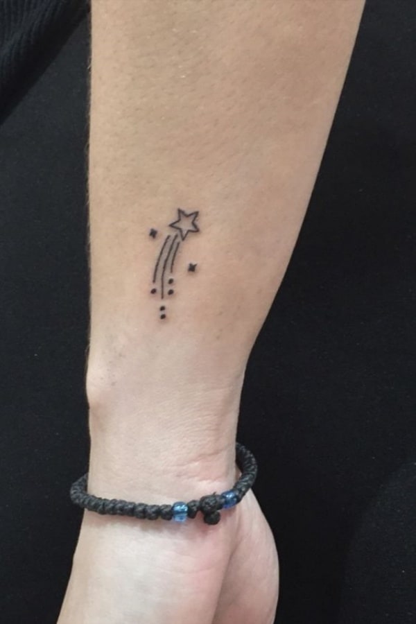 minimalist shooting star tattoo designs