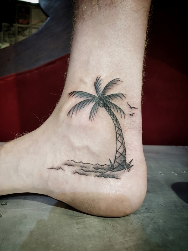 Stick and Poke Tattoo  Hand poked palm tree tattoo on the Achilles heel