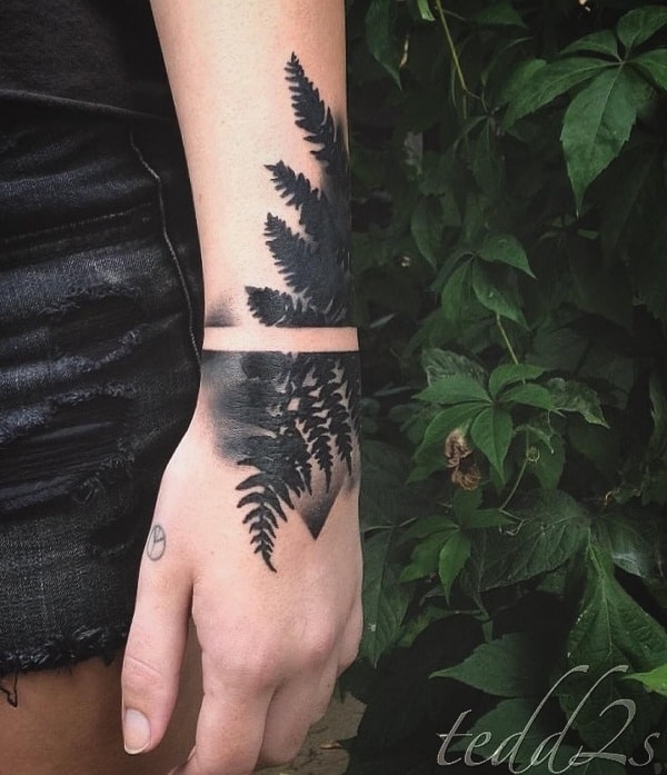 Negative space floral arm tattoo  Tattoogridnet