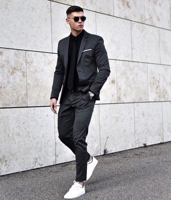 black suit with white sneakers